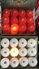 Glowing candle Christmas decoration in a sales display of 12 incl. 7cm battery,  red or white