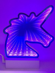 Luminous 3D LED mirror image with unicorn motif